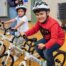 Students at Fruit Valley Elementary School get ready to ride a bike.